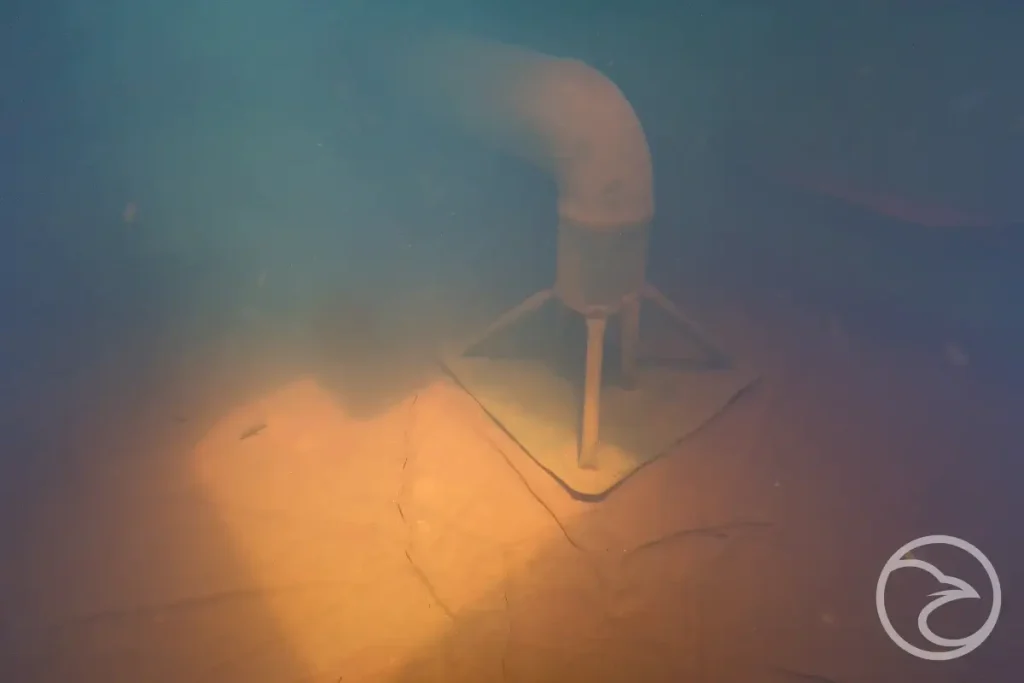 Drone inspecting fire water tank from above
