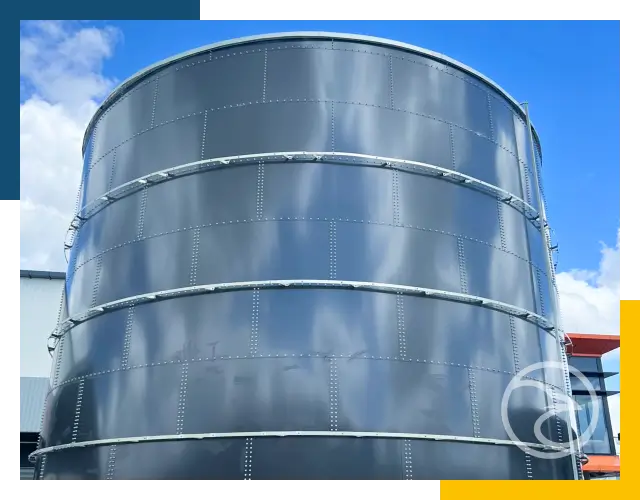 Large round storage tanks in Sydney warehouse area