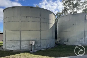 Team performing fire tank corrosion testing and repairs