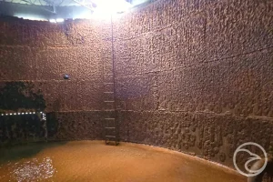 Microbial corrosion mechanisms forming on metal surfaces in storage systems