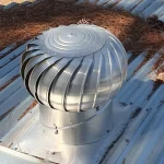 Whirly Birds roof ventilation turbine installed on a water tank roof